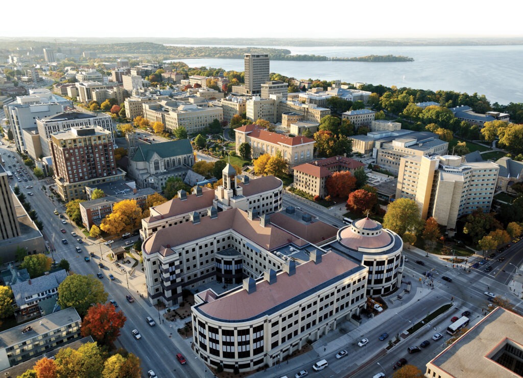 An aerial view of Grainger Hall and its campus surroundings